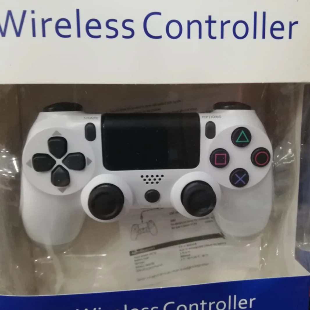 ذراع تحكم لاسلكي دوال شوك 4 - اللون الأبيض الثلجي لجهاز PS4