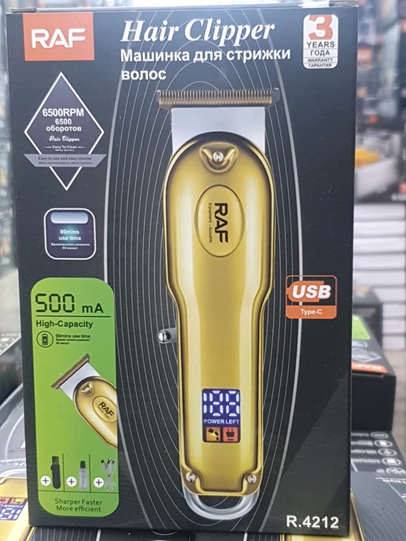 RAF Hair Clipper with Modern Golden Design for Home and Professional Use Suitable for All Hair Types Easy to Use and Clean Comes with USB Connectivity and Outstanding Features for Optimal Performance.