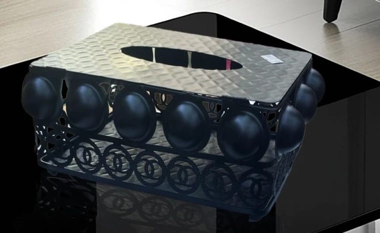 Luxury Tissue Box by Brand X, featuring an elegant circular design with distinctive patterns, perfect for upscale homes and executive offices seeking a touch of elegance and practicality. Ideal for hygiene and style.