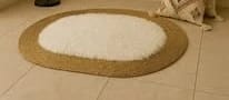 Bohemian Round Comfort Rug by Bado, Perfect for Bedrooms and Living Rooms, Featuring an Elegant Design Combining Comfort and Luxury, Tailored for Modern Bohemians Who Appreciate Intricate Details and Sophisticated Decor Touches.