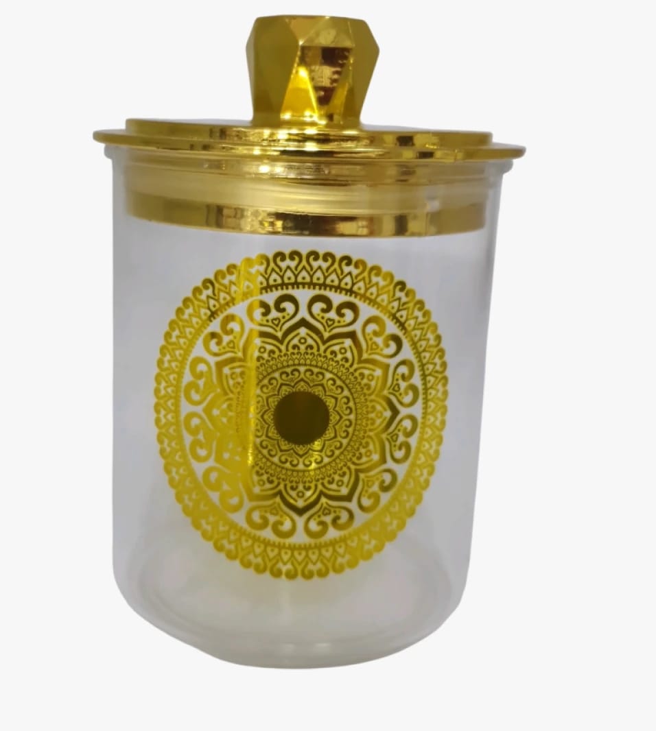 Luxury Decorative Glass Storage Jar Adorned with Elegant Gold Pattern and Golden Lid for a Distinctive Aesthetic Touch Perfect for Homes and Hospitality Venues.