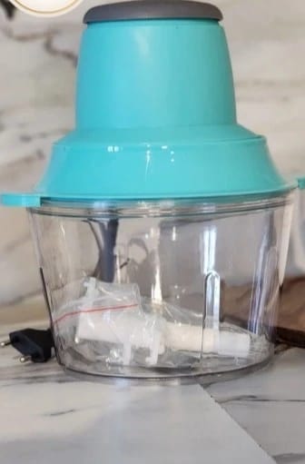 Electric Food Processor with Blue Lid by Renowned Brand, Modern Design for Home and Contemporary Kitchen Use