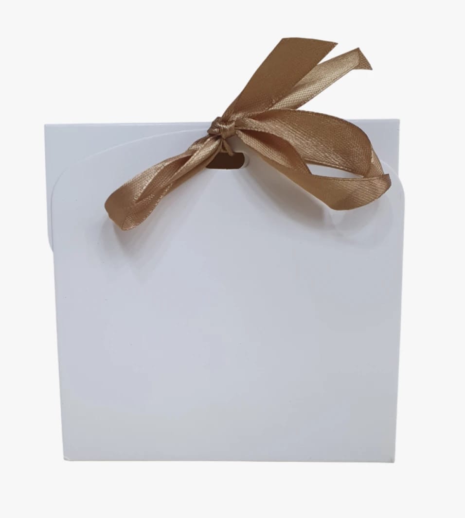 Elegant White Gift Box with Gold Ribbon, Perfect for Thoughtful Presentations for Loved Ones on Special Occasions.