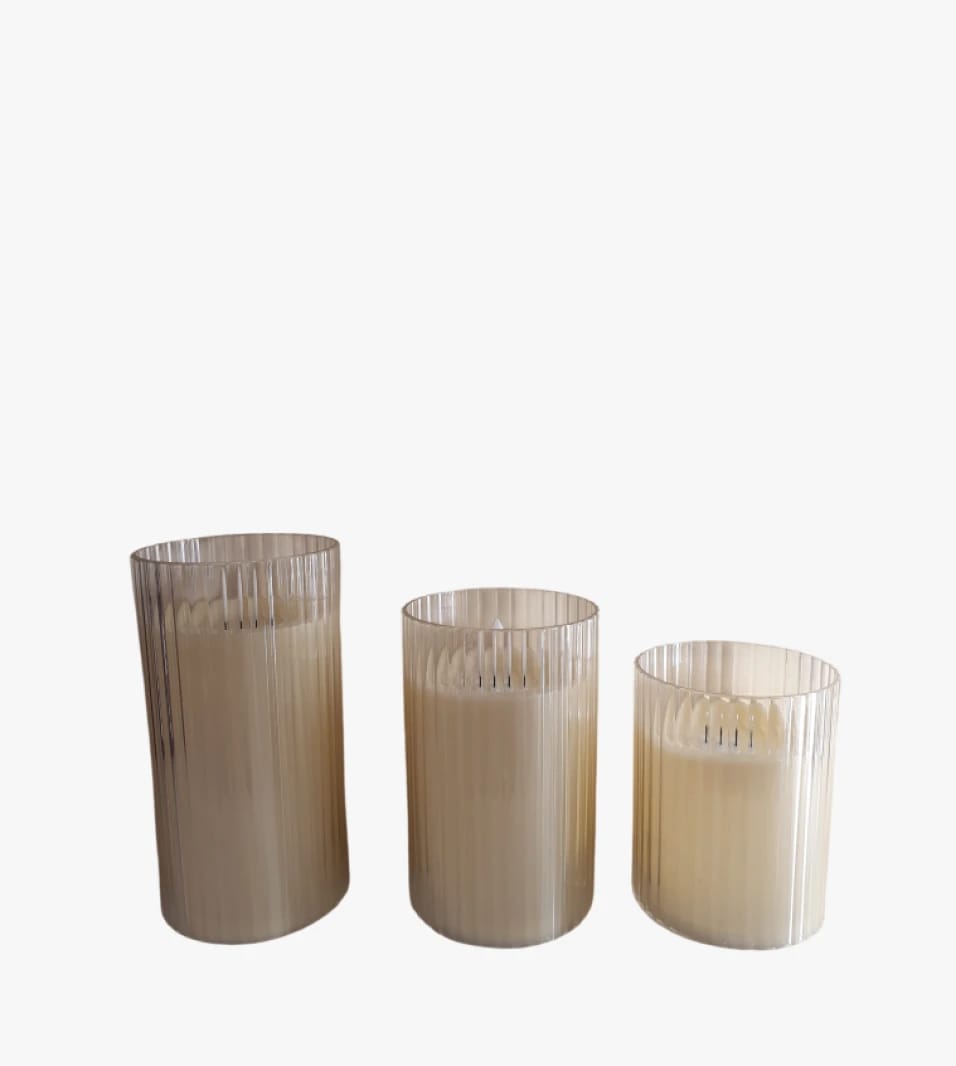 Elegant Decorative Candles with Ribbed Glass Holders Ideal for Modern Interior Decor by Renowned Brand
