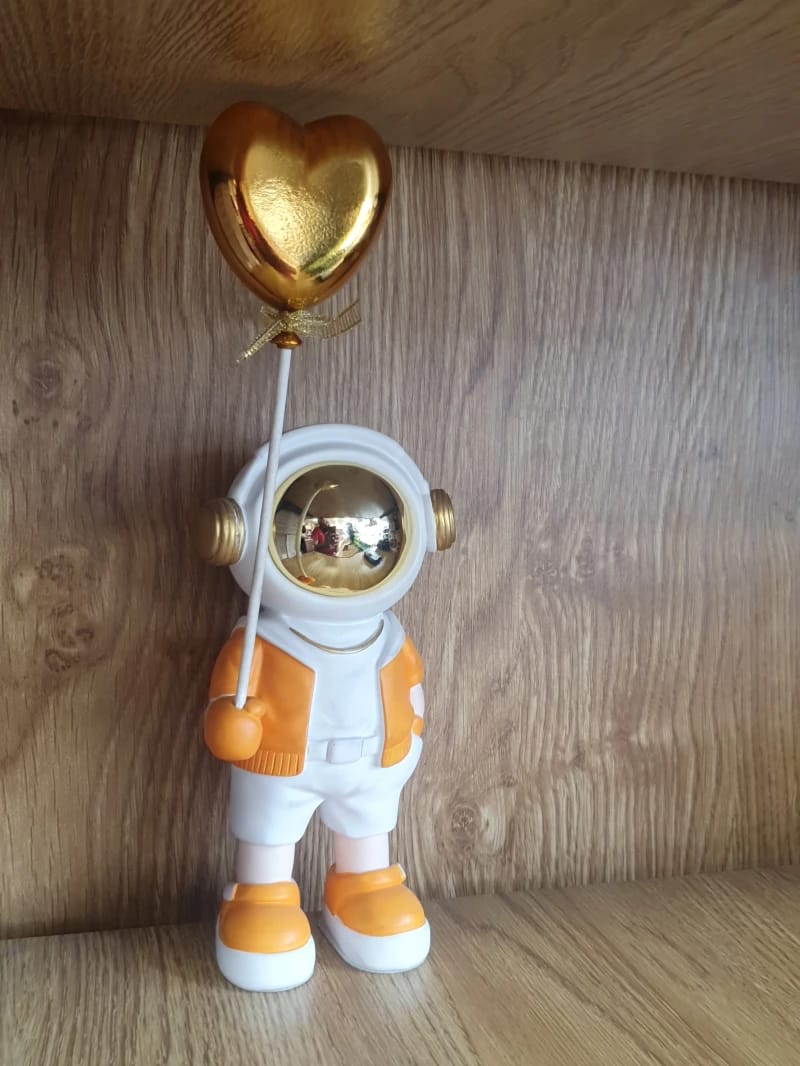 Decorative Astronaut Figurine with Gold Heart Balloon for Indoor Home and Office Space Enthusiasts
