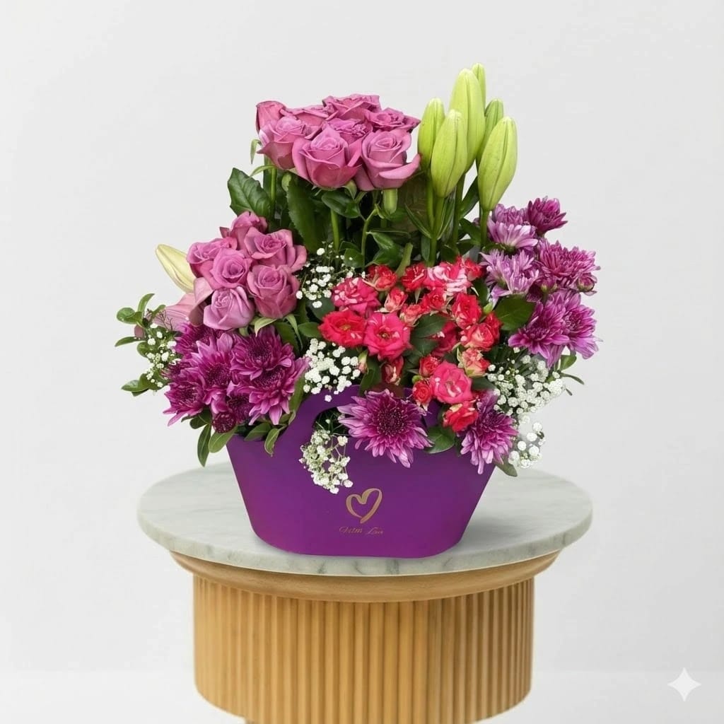 Mixed Purple Flower Arrangement in Gift Bag